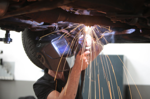 Reduce welder exposure to chromium fumes during exhaust system repairs.